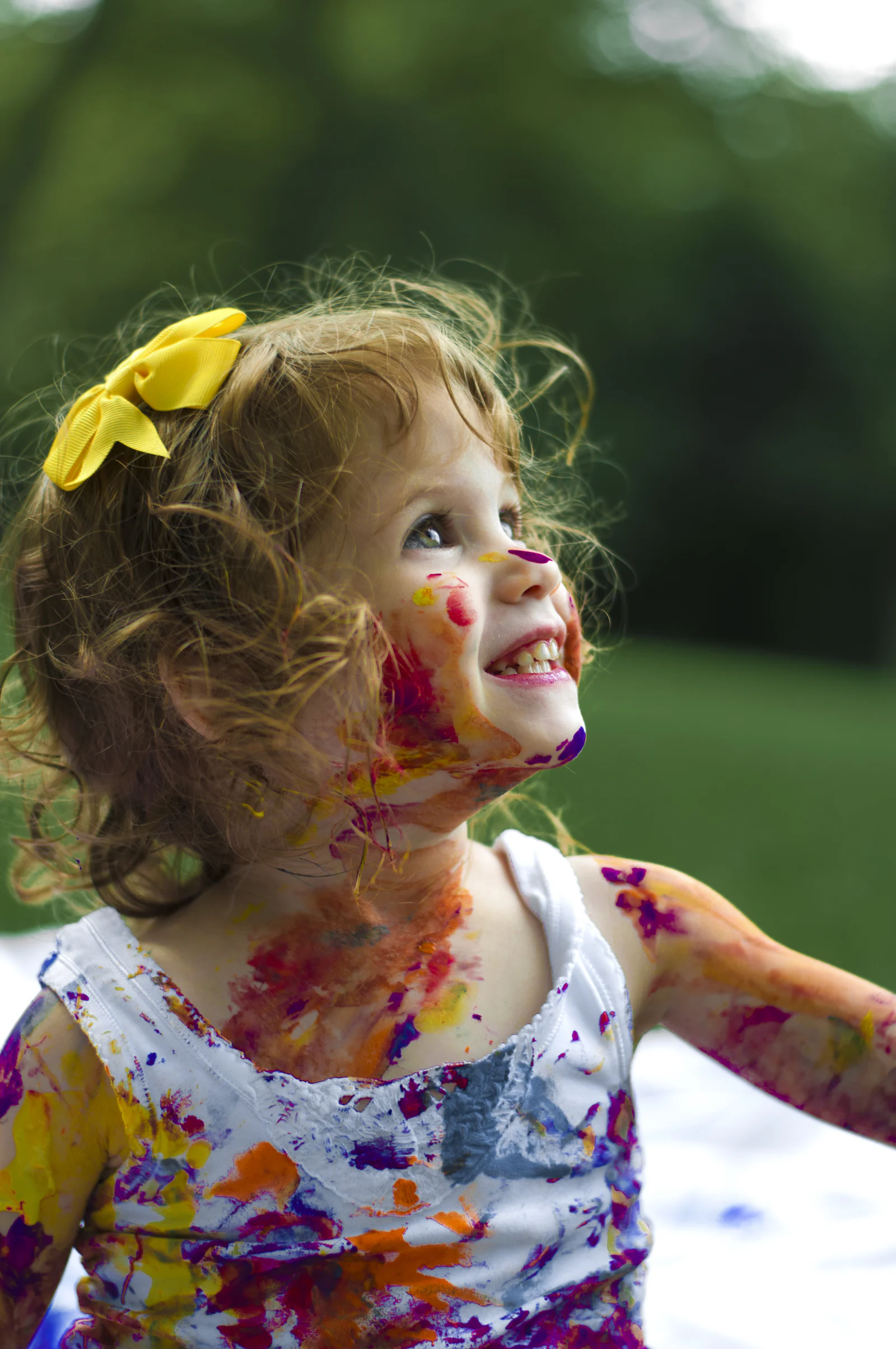 Young child playing outdoors, illustrating how divorce affects children at different ages